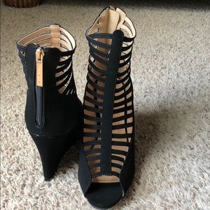 Brand new black wedges. Never wore them!